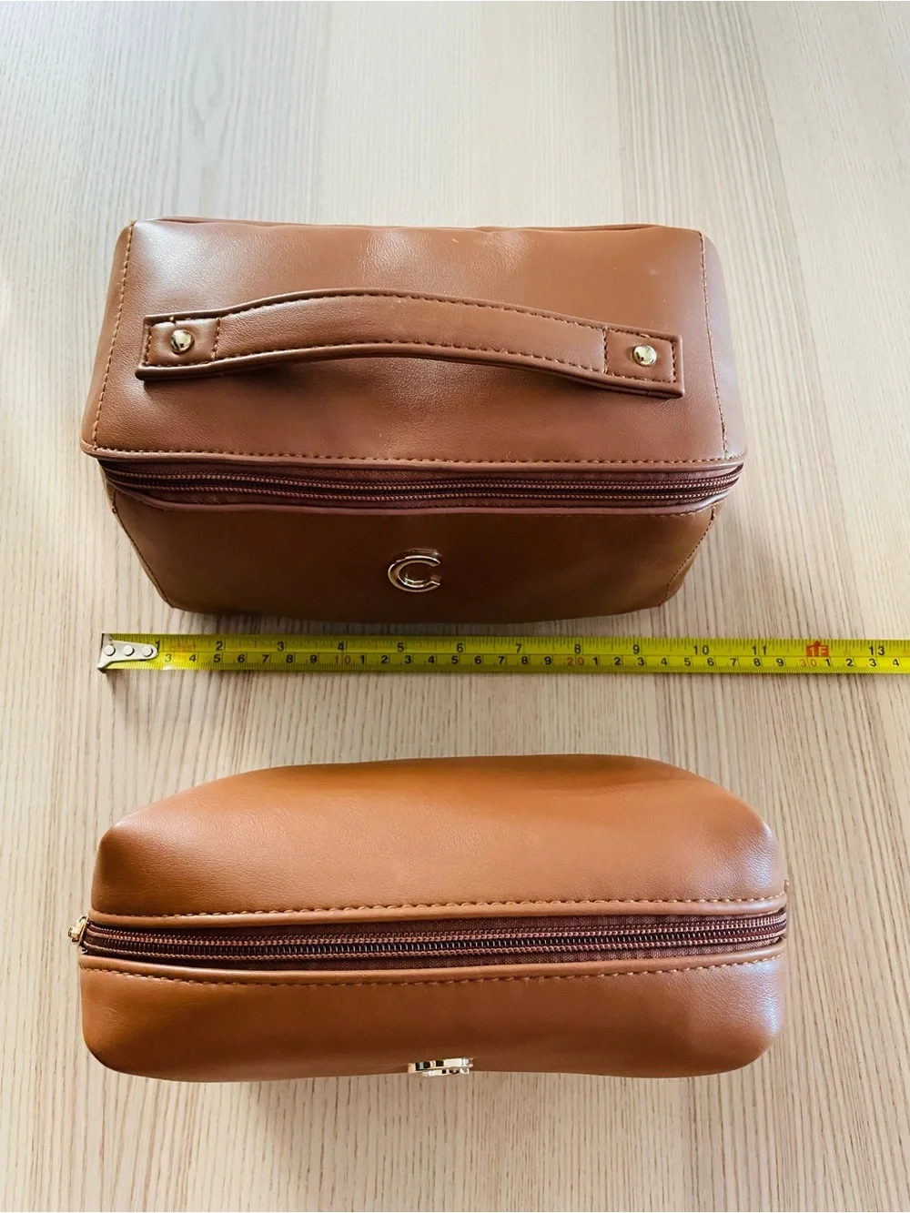 Tan faux leather matching cosmetic bag/ case set, gold “C” emblem, excellent